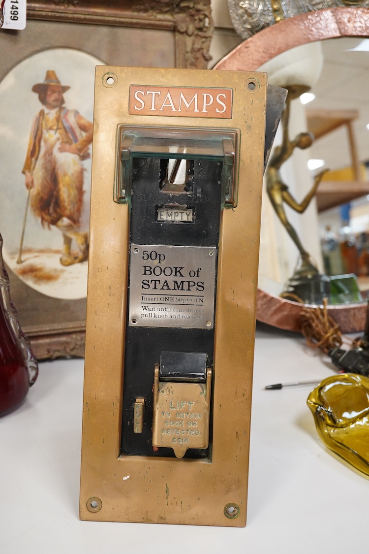 Brass wall mounted postage stamp machine, 40.5cm high